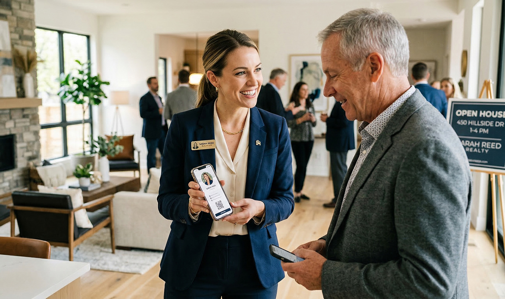Realtor showing her digital contact card to a buyer at an open house